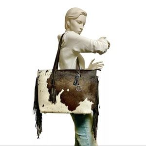 JUST IN! One of a kind Raviani Tote! Cow hide.